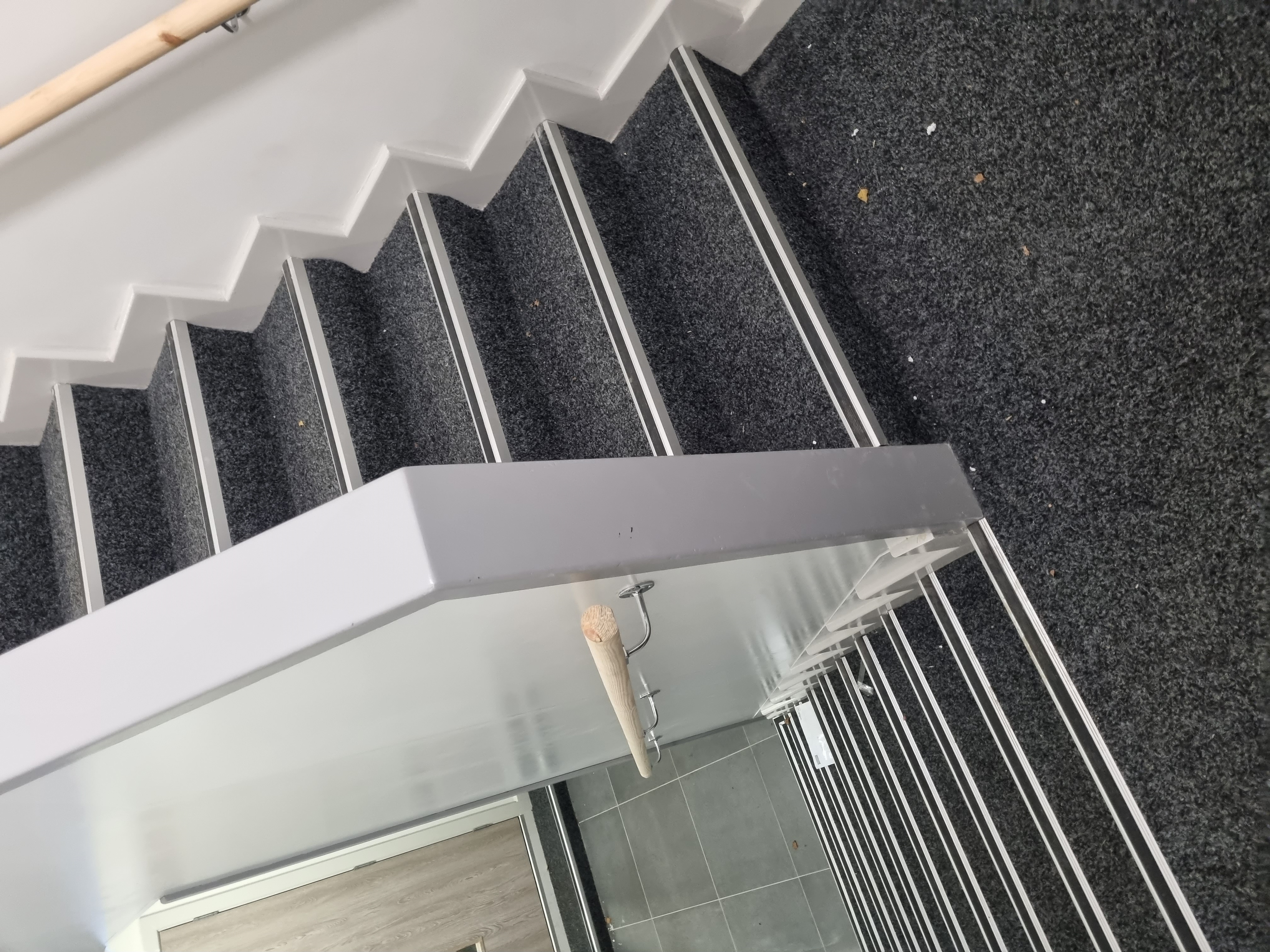 Dark grey carpet on commercial staircase