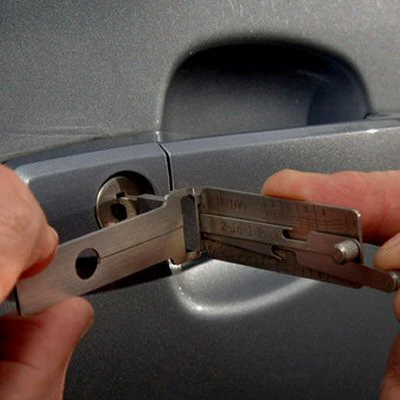 Auto locksmith at work