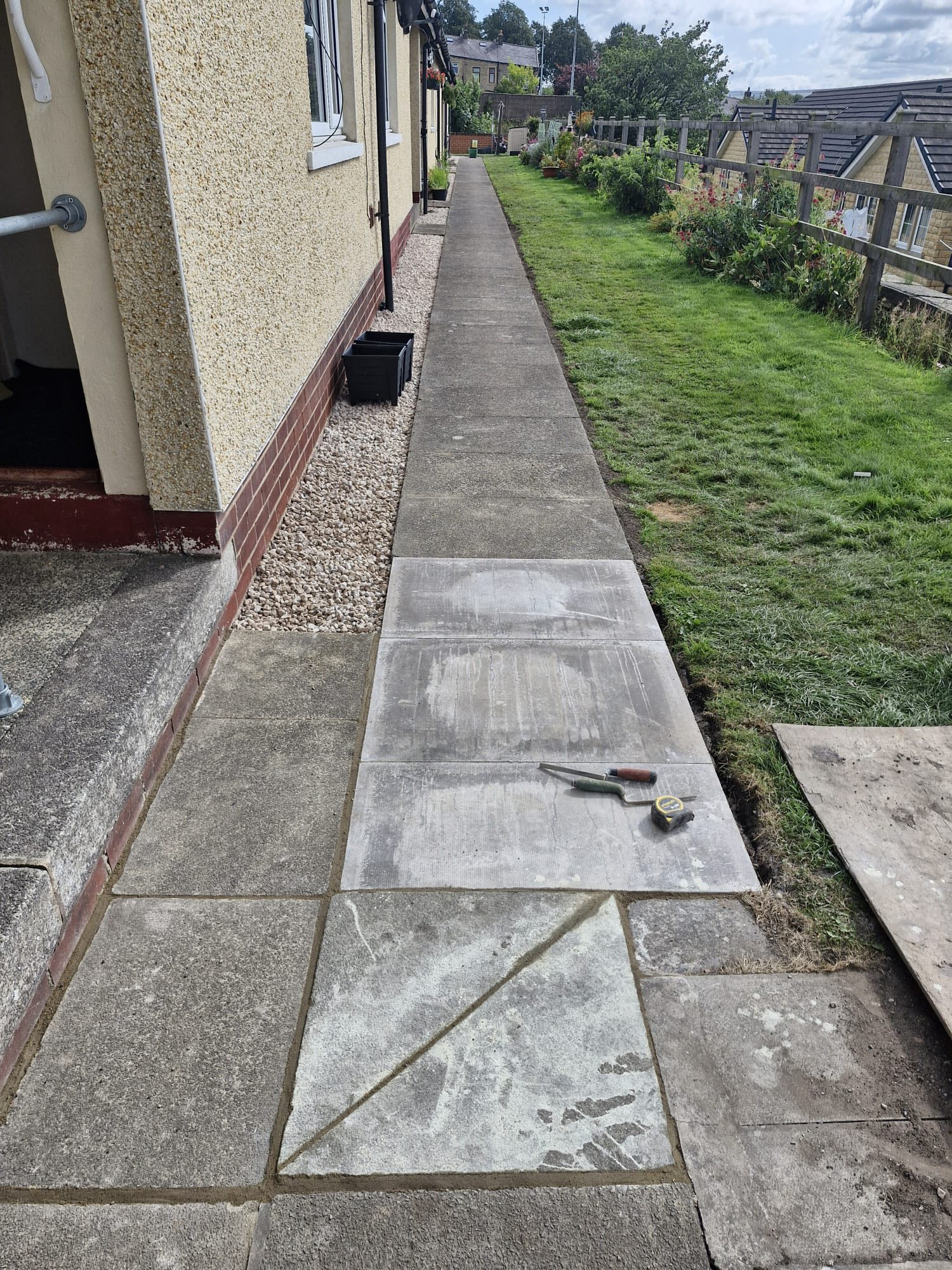 Footway repairs and widening for elderly wheelchair access Colne Housing Association Lancashire