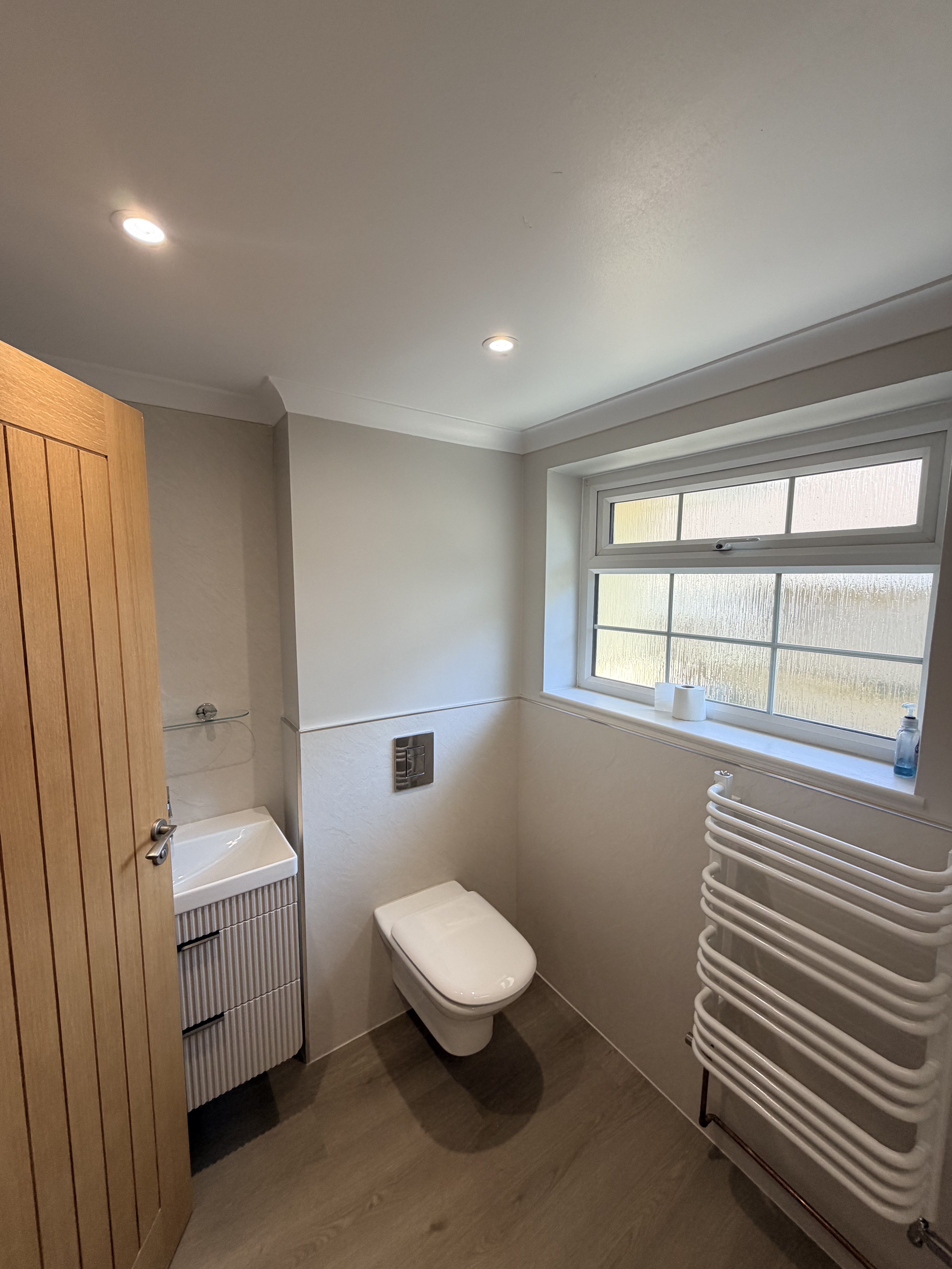 Full bathroom view showing vanity, WC and new flooring — Bearwood bathroom refurbishment