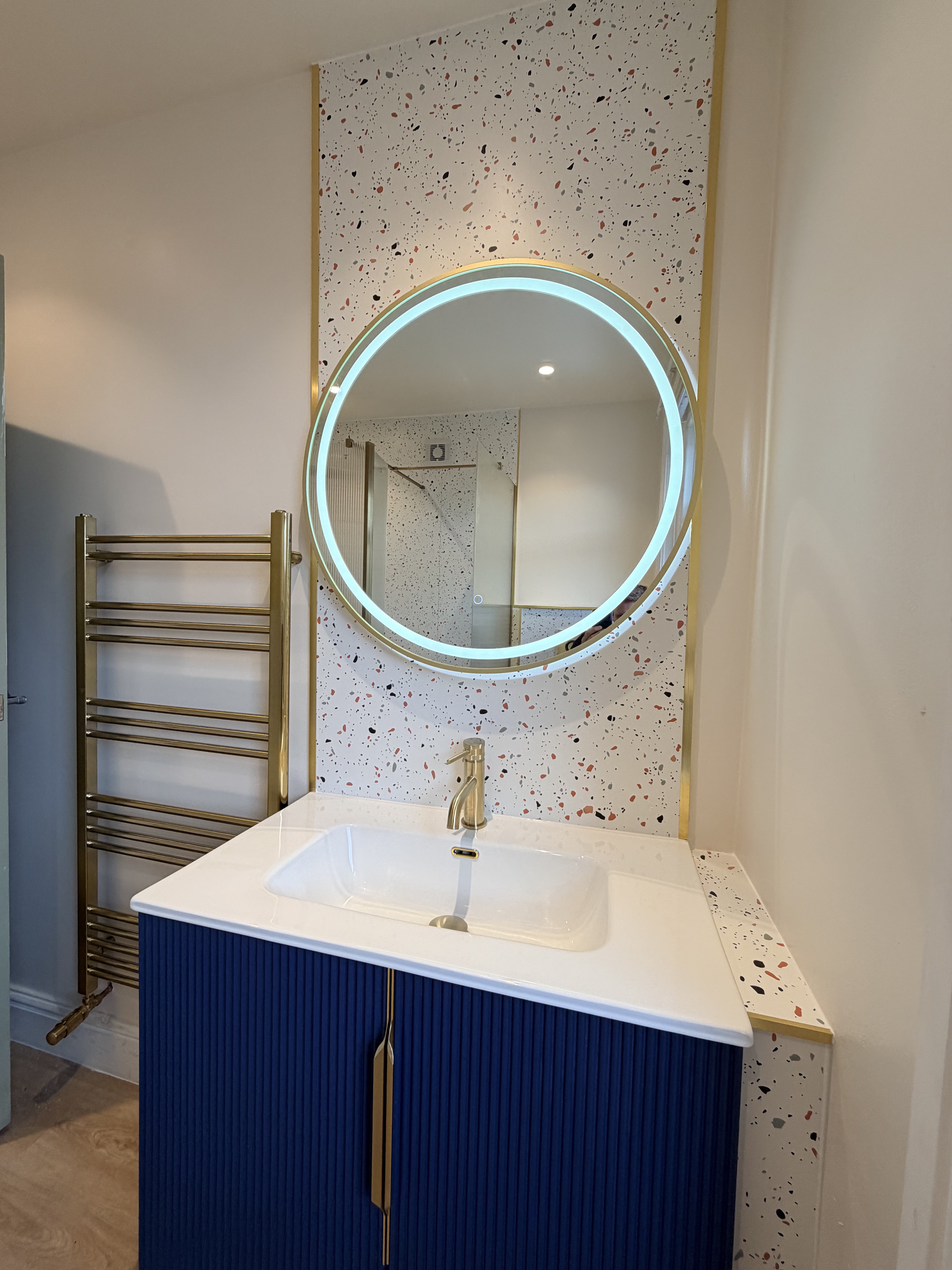 Walk-in shower with reeded glass panel and terrazzo tiles — Charminster, Bournemouth