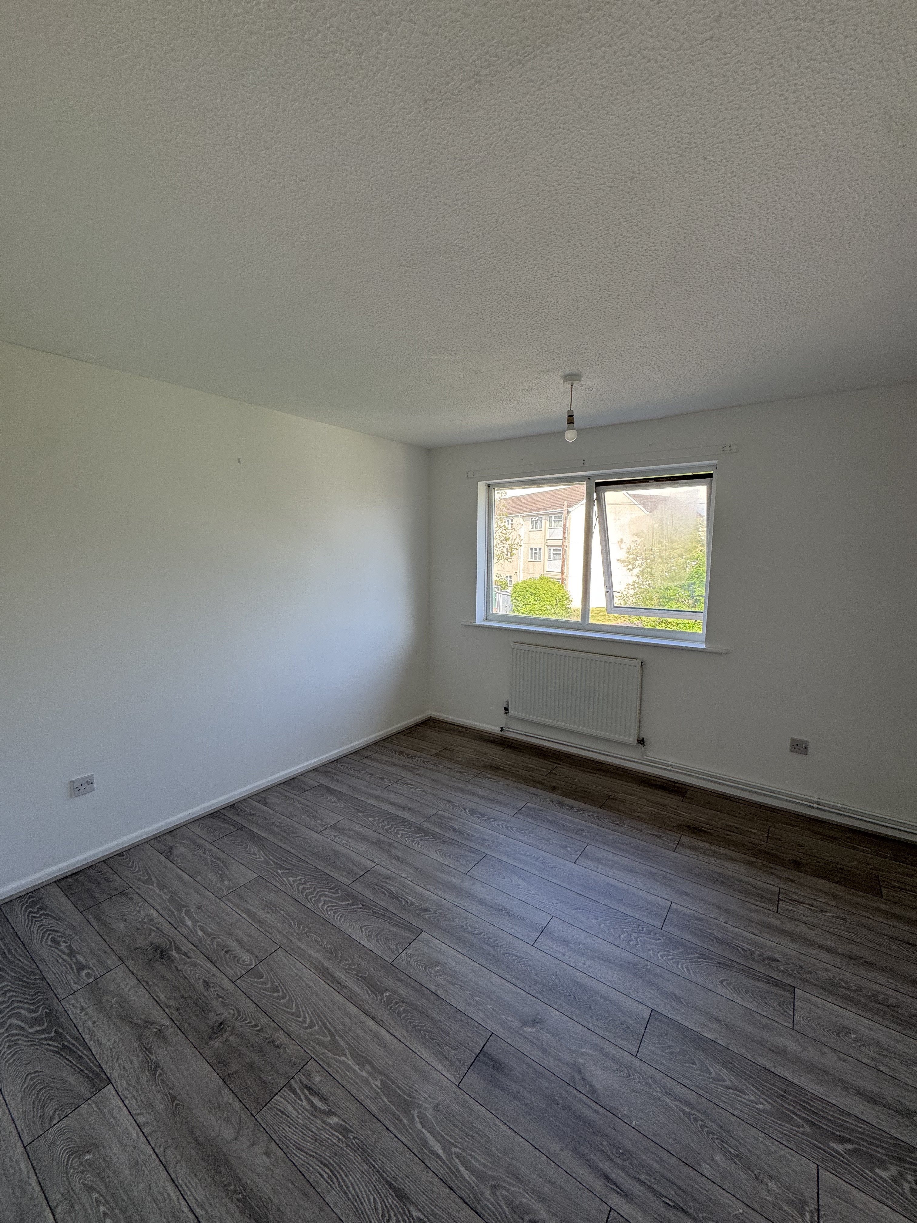 Laminate flooring installation in a freshly decorated room