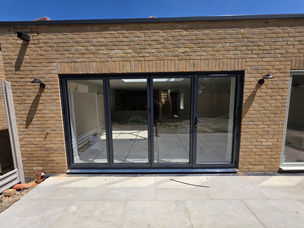 Anthracite Bifolds — New Build Extension