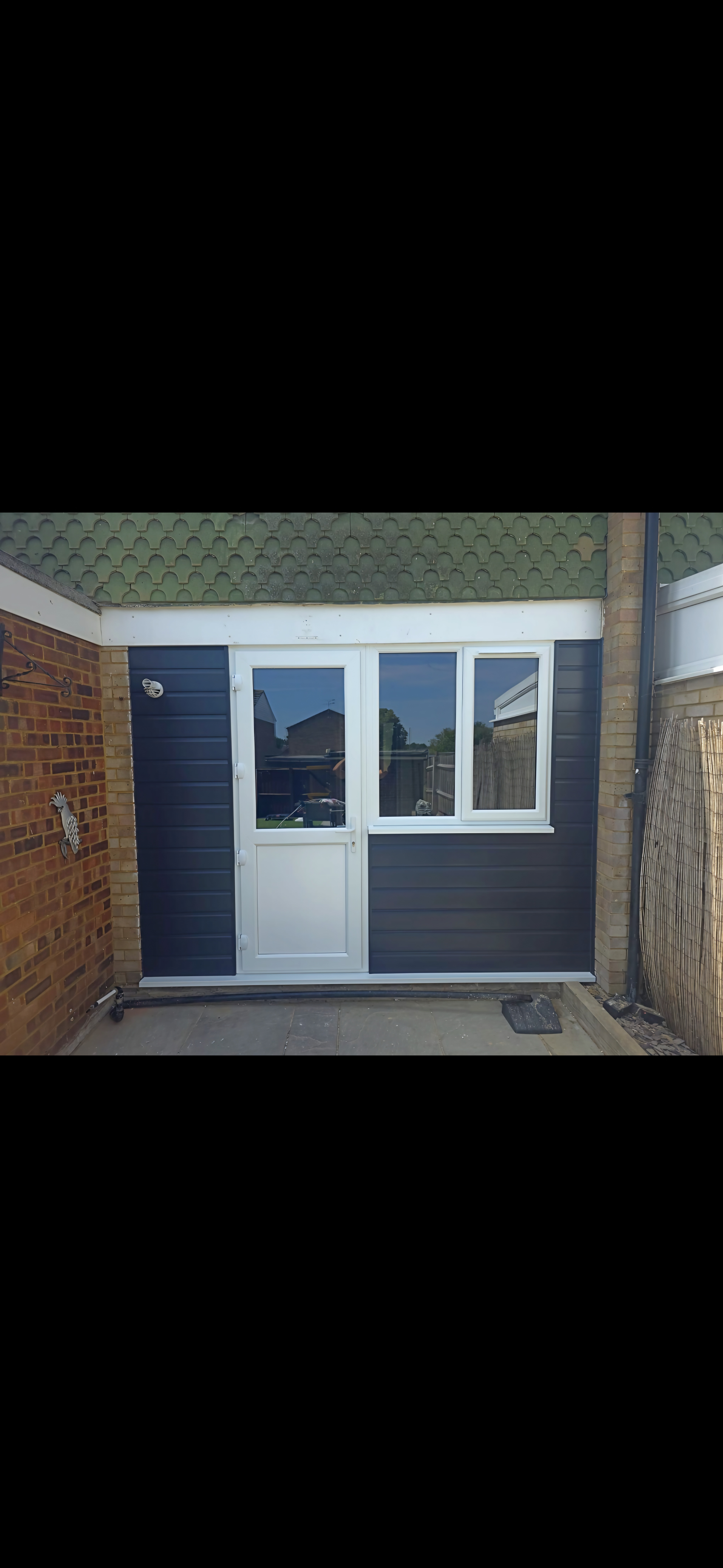 Anthracite Cladding with Door & Window