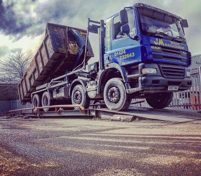 JM Waste Management skip truck on weighbridge