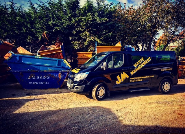 JM Waste Management van and skips