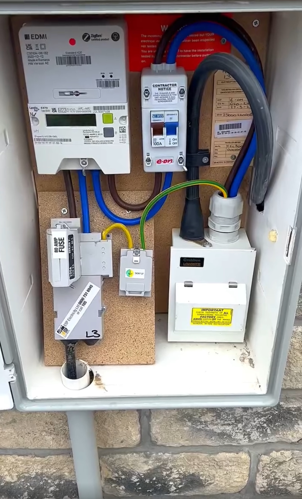 Electricity meter with meter tails and double pole isolator