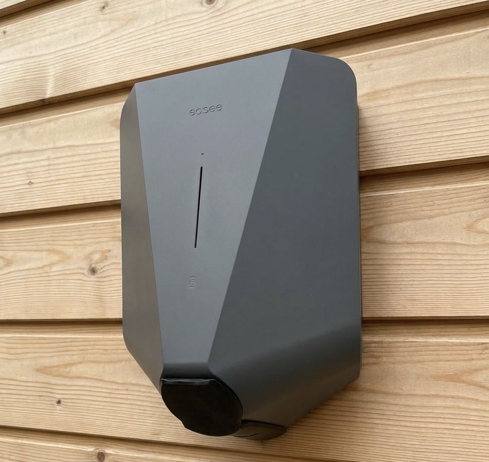 Easee One EV charger installed on timber cladding by Power Team Electrics, award-winning geometric EV charger design